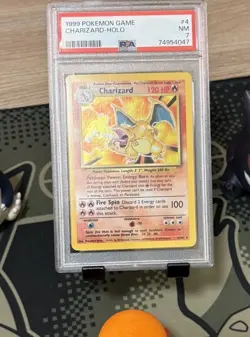 PSA 7 Near Mint Charizard Holo Base Set Unlimited Pokemon 1999 - Image 1