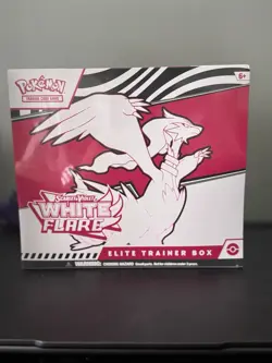 White flare Pokemon TCG ETB sealed in hand - Image 1