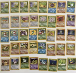 Lot of 72 1st Edition Pokemon Cards - Fossil, Jungle, Neo Genesis, Team Rocket - Image 1