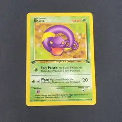 Ekans 46/62 FOSSIL 1st Edition 1999 Pokemon Card - LP - Image 1