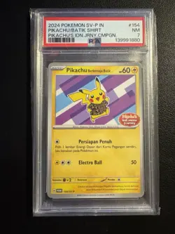 PIKACHU/BATIK SHIRT PSA 7 PIKACHU'S IDN.JRNY.CMPGN. 2024 POKEMON SV-P IN - Image 1