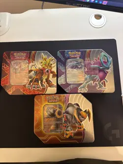 Pokemon Gouging Fire EX, Walking Wake EX AND Raging Bolt Ex Tin Set - Unopened - Image 1