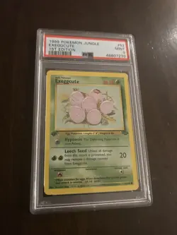 1999 Pokemon Jungle 1st Edition #52 - Exeggcute PSA 9 - Image 1