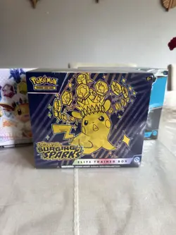 POKEMON SURGING SPARKS FACTORY SEALED ETB - Image 1