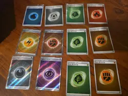 12x English and Japanese Pokemon Basic Holo Energy mixed card lot assorted sets - Image 1