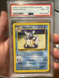 PSA 8 NM-MT Wartortle EVOLUTION BOX ERROR Pokemon PORTUGUESE Base Set WOTC 1999 - Image 1