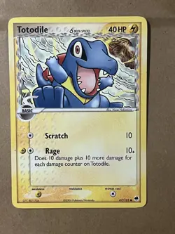 Totodile 67/101 (LP) - Dragon Frontiers - Non-Holo - Image 1