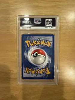 1999 Pokemon Base Hitmonchan Holo 7/102 PSA 7 NM - Image 2