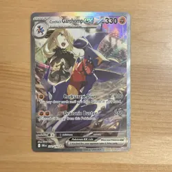 Cynthia's Garchomp ex (SIR) & Cynthia's Roserade (IR) Pokemon (DRI) in cases - Image 1