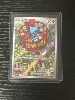 Pokemon TCG Mega Evolution Riolu Black Star Promo Illustration #10 Near Mint NM - Image 1
