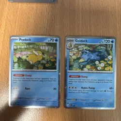 Psyduck MEP 007 & Golduck MEP 008 Promo Card - NM - Cosmos Holo - Image 1