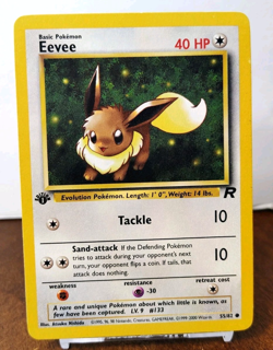 POKEMON EEVEE 55/82 1ST EDITION TEAM ROCKET LP-NM - Image 1