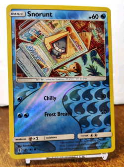 POKEMON SNORUNT 31/145 REVERSE HOLO GUARDIANS RISING LP TOMOKAZU KOMIYA - Image 1