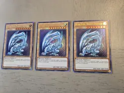 Yugioh Playset of 3 Blue Eyes White Dragon LCKC-EN001 Ultra Rare 1st Edition NM - Image 1