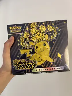 Pokemon TCG Surging Sparks ETB Factory Sealed - Image 1