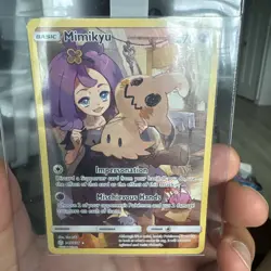 Pokemon TCG: Mimikyu 245/236 Cosmic Eclipse Sun & Moon Holo - Image 1