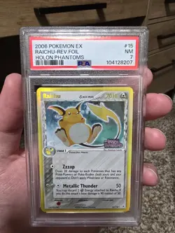 Pokemon 2006 Holon Phantoms Raichu Delta Species Reverse Holo 15/110 PSA 7 - Image 1