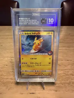 Pokemon Surfing Pikachu 329/SM-P Playing in the Sea Promo 2019 TAG 10 GEM MINT - Image 1