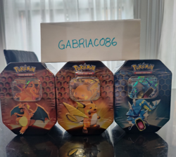 Pokemon Hidden Fates Tins Set Of 3 Charizard, Raichu, Gyarados - Image 1