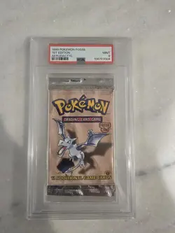 1999 POKEMON FOSSIL 1ST EDITION AERODACTYL ART SEALED BOOSTER PACK PSA 9 - Image 1