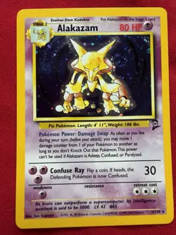 Pokemon Base Set 2 Alakazam 1/130 NM Holo 🌀Swirl Card Rare Wizards Of The Coast - Image 1