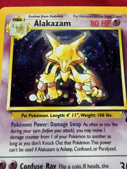 Pokemon Base Set 2 Alakazam 1/130 NM Holo 🌀Swirl Card Rare Wizards Of The Coast - Image 3