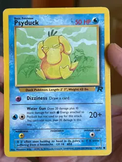 POKEMON PSYDUCK 65/82 COMMON TEAM ROCKET MP CARD - Image 1