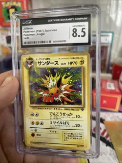 CGC 8.5 Jolteon Japanese Jungle 135 Holo Pokemon Card psa - Image 3