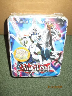 Yugioh 2011 Collectors Tin Number 10: Illumiknight Factory Sealed + packs & more - Image 1