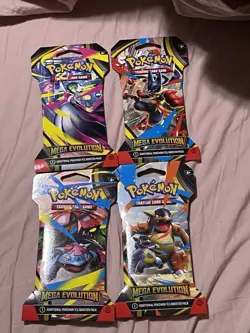 Mega Evolution Sleeved Booster Pack Art Set New Pokemon Set of 4 Sealed Packs - Image 1