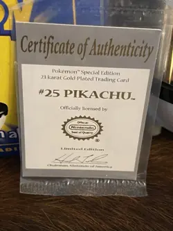 1999 Pokemon Pikachu 23K gold-plated trading card with ball and box. - Image 2