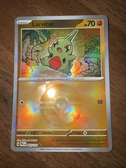 Pokemon Larvitar Poke Ball Pattern 047/131 Sv: Prismatic Evolutions Holo - Image 1