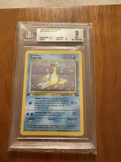 Pokemon Fossil 1st Edition Lapras Holo Rare 10/62 Beckett Graded 9 1999 - Image 1
