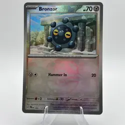 Bronzor (Master Ball Pattern) 066/131 Prismatic Evolutions NM Pokemon TCG - Image 1