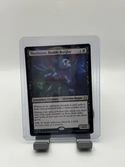 MTG, Tinybones, Bauble Burglar $3 ORDER MIN 72 Foundations Regular - Image 1