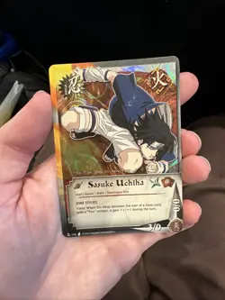 Naruto CCG Sasuke Uchiha Diamond Foil Card 116 Damaged Condition - Image 1