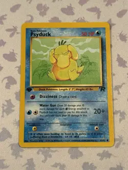 [ NM ] Psyduck 65/82 Team Rocket 1st Edition Basic Pokemon Card 50 HP Common - Image 1