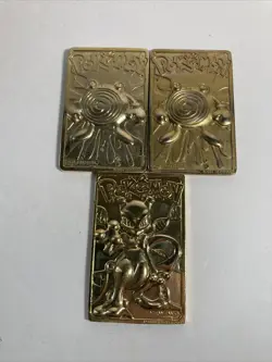 1999 Pokemon 23k Gold Plated Card Mewtwo Poliwhirl - Image 1