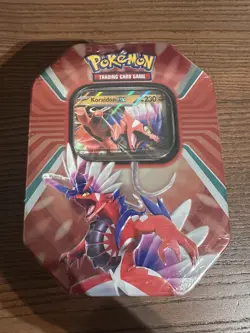 Pokemon TCG: Paldea Legends Koraidon EX Tin - BRAND NEW SEALED (4 Booster Packs) - Image 1