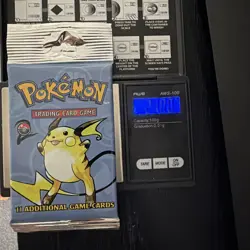 Sealed Pokemon Base Set 2 Unlimited Booster Pack Raichu WOTC 21.00g - Image 1