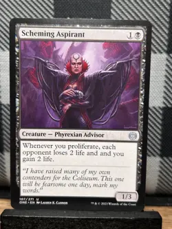MTG TCG: Scheming Aspirant 107/271, Phyrexia: All Will Be One - Image 1