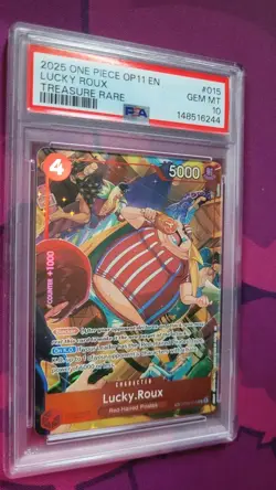 2025 ONE PIECE OP11-A FIST OF DIVINE SPEED TREASURE RARE #015 LUCKY ROUX PSA 10 - Image 1