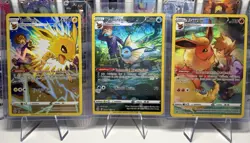 Vaporeon, Jolteon and Flareon Brilliant Stars Trainer Gallery Pokemon Card NM - Image 1
