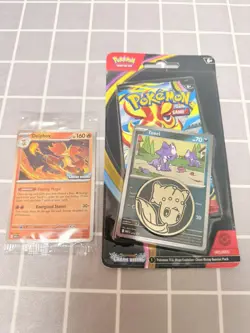 Pokemon Chaos Rising Booster Pack + Toxel Promo + Chikorita Coin + Delphox Promo - Image 1