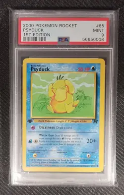 2000 POKEMON ROCKET PSYDUCK #65 1st EDITION PSA 9 - Image 1