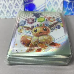 Pokemon TCG Prismatic Evolutions Eevee Card Sleeves Pack & Placard Holders - Image 2