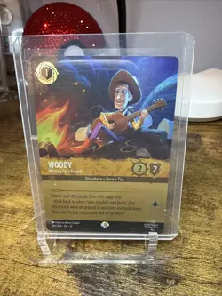 Disney Lorcana TCG Woody - Waiting for a Friend (Epic) 205/204 Wilds Unk Holo - Image 1