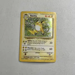 Pokemon TCG 1999 Base Set Card -- Raichu 14/102 Holo **Worn** - Image 1