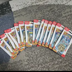 Pokemon Surging Sparks Blister Pack lot of 12 with promo - Image 1