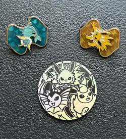 Pokemon Jolteon & Vaporeon Eevee Evolutions Pin & Coin - VMAX Premium Set - Image 1